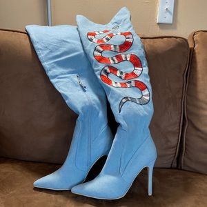 Thigh high Denim Boots, used once , light blue with snake embroidered .